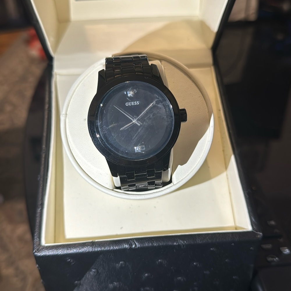 Guess men’s watch black band with black dial